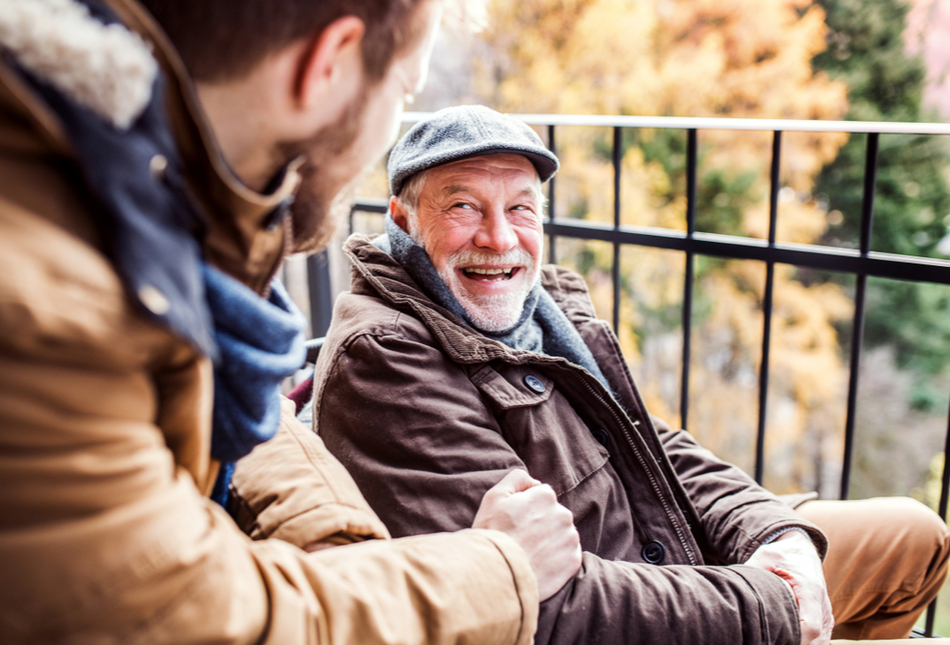 Older father talking with son