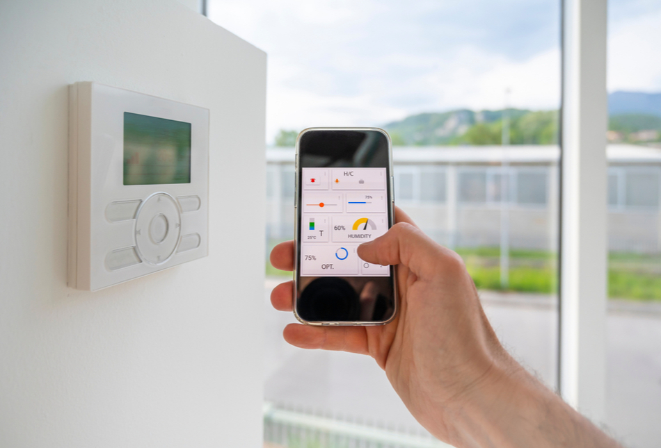 Someone checking energy use on a smart phone.