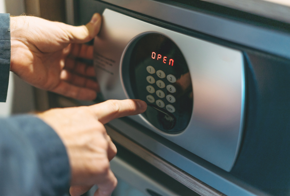 Someone opening a safe.