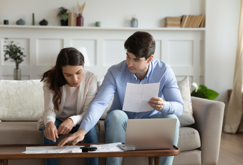 A couple reviewing paperwork.