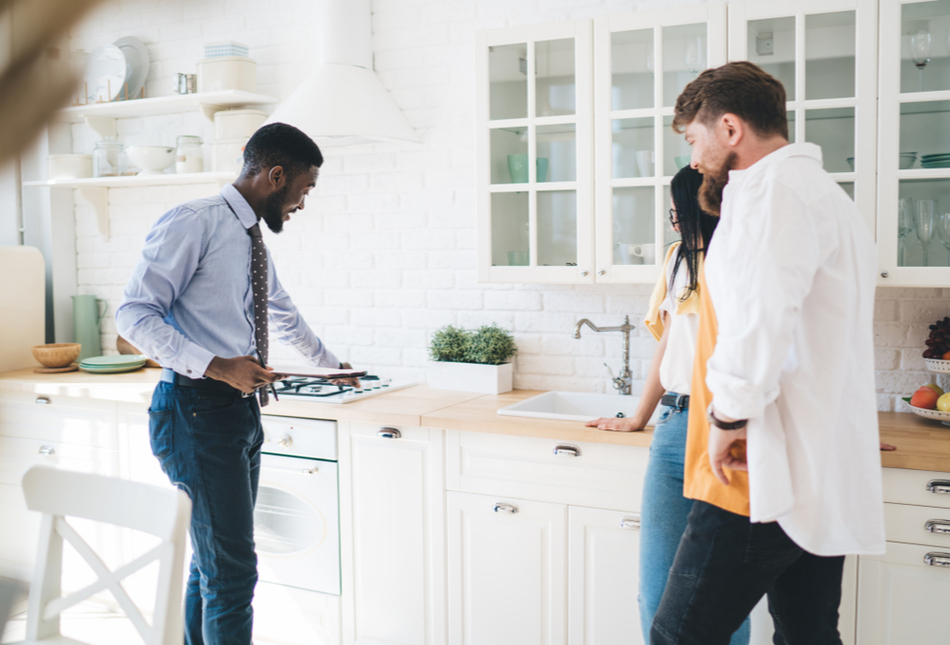 A young couple viewing a property.