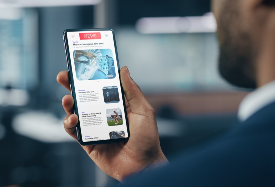 A man checking the news on his smartphone.