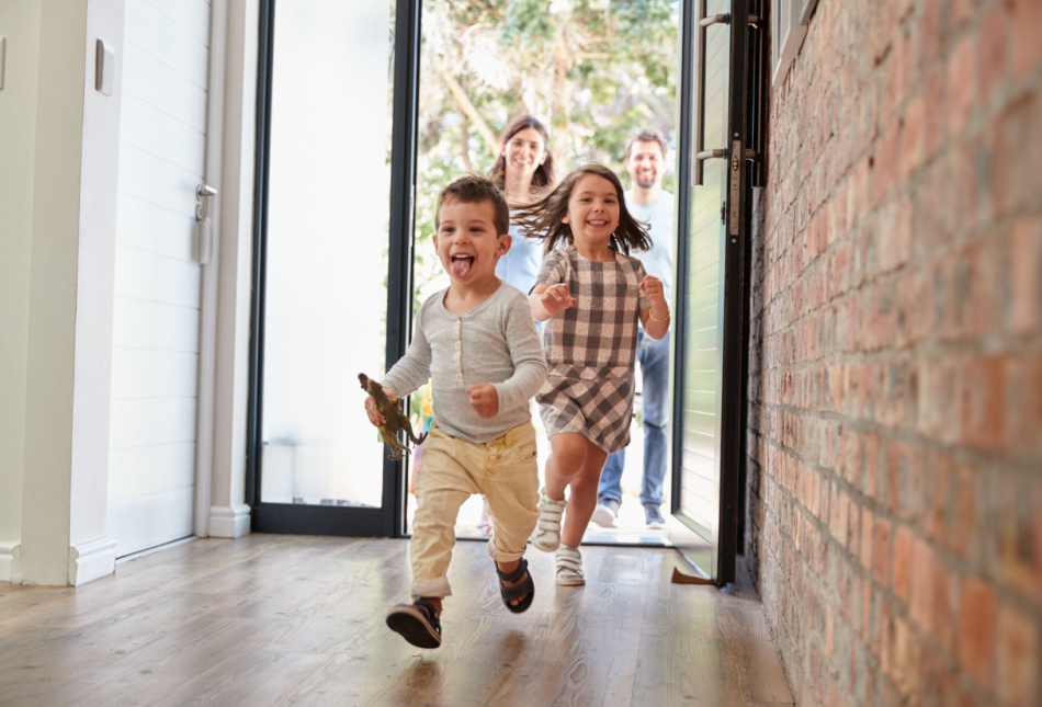 Children running through the front door.