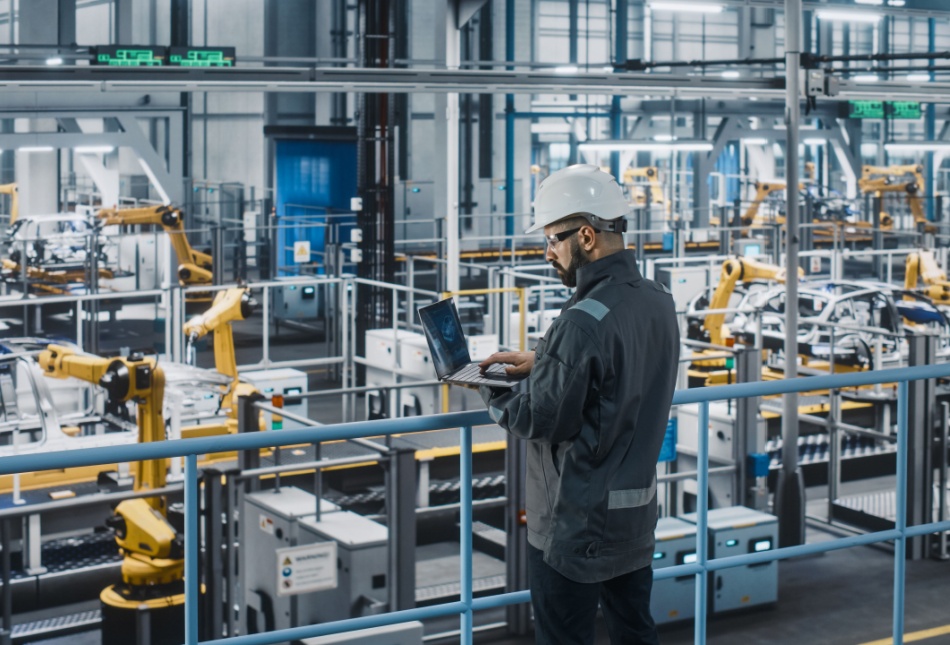 A worker in a car factory.