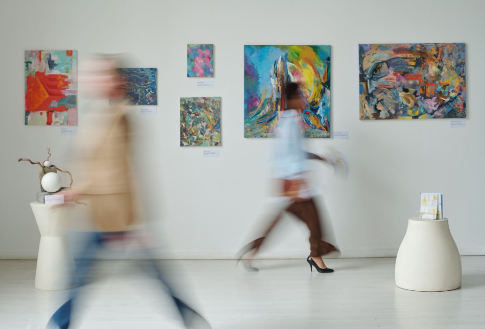 People walking through a museum.