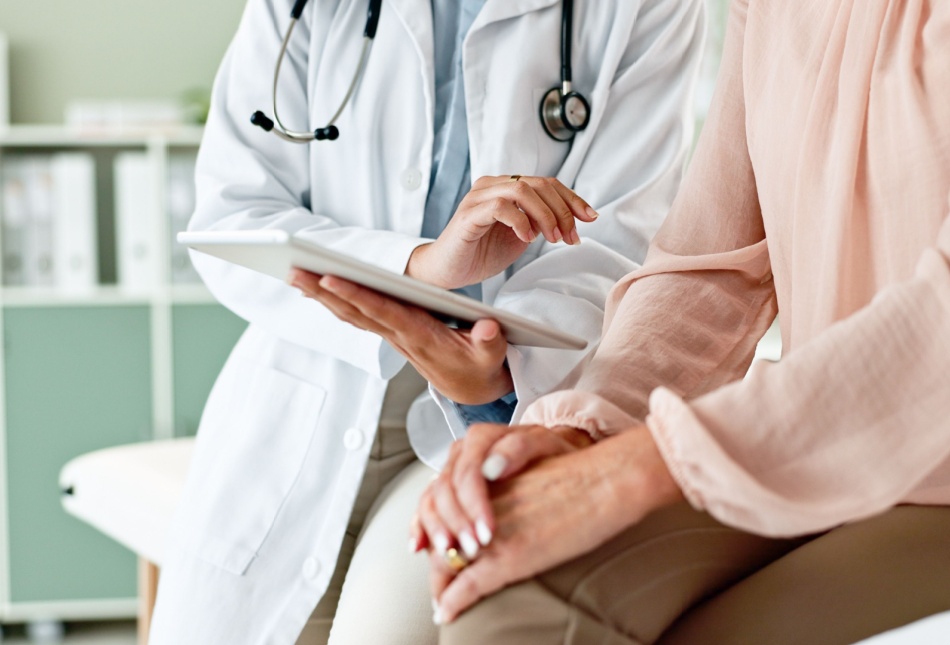 A doctor talking to a patient.