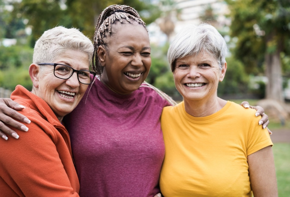 A group of women smiling.