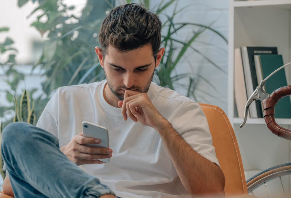 A man using his phone.