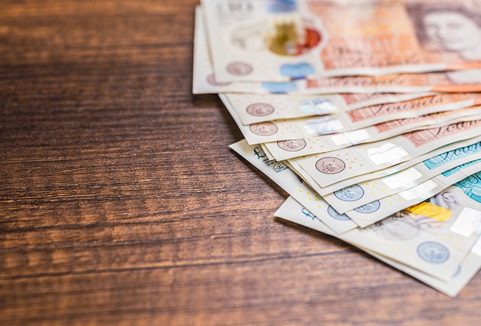 UK bank notes on a table.